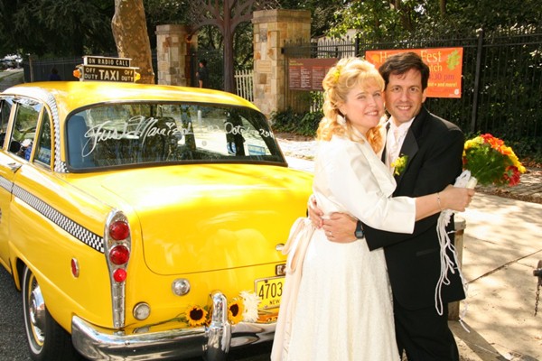 After the wedding, with our gorgeous yellow taxi.