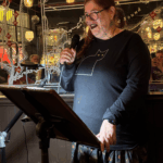 Emcee Amy Goldschlager (photo by Amy Grech)